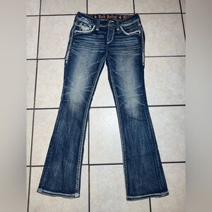 Rock Revival Dark Blue Flare Jeans size 26 (Have a hole on the back)